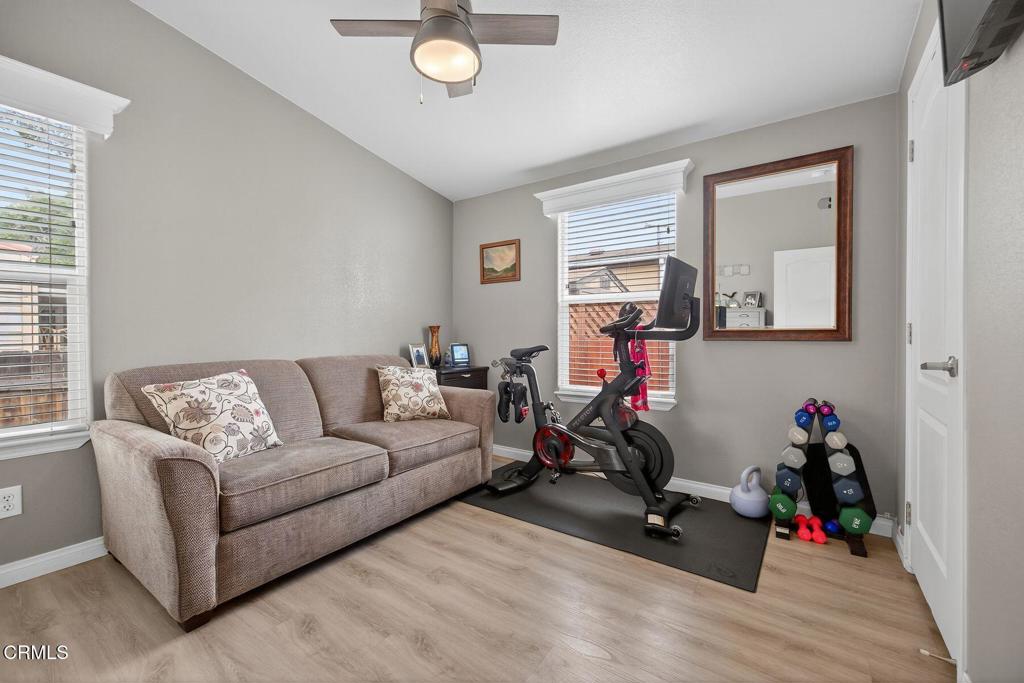 1273 South Rice Road, Unit 53 Ojai, CA 93023 - Photo 15 of 42 a living room with furniture and a wooden floor
