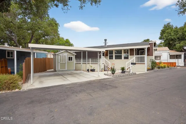 front view of a house with a patio
