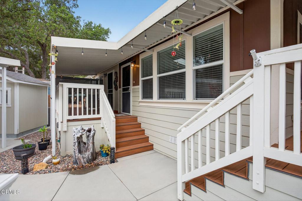 1273 South Rice Road, Unit 53 Ojai, CA 93023 - Photo 23 of 42 a view of house with wooden stairs and windows