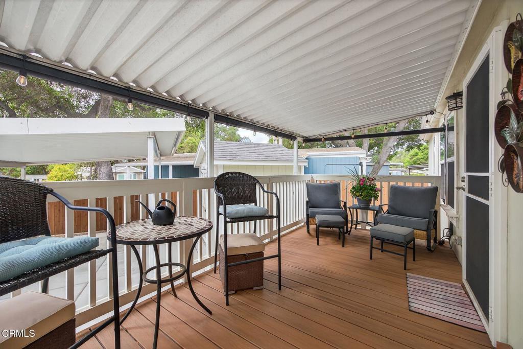 1273 South Rice Road, Unit 53 Ojai, CA 93023 - Photo 5 of 42 a view of a dining room with furniture window and wooden floor