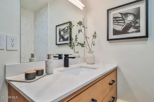 a bathroom with a shower and toilet