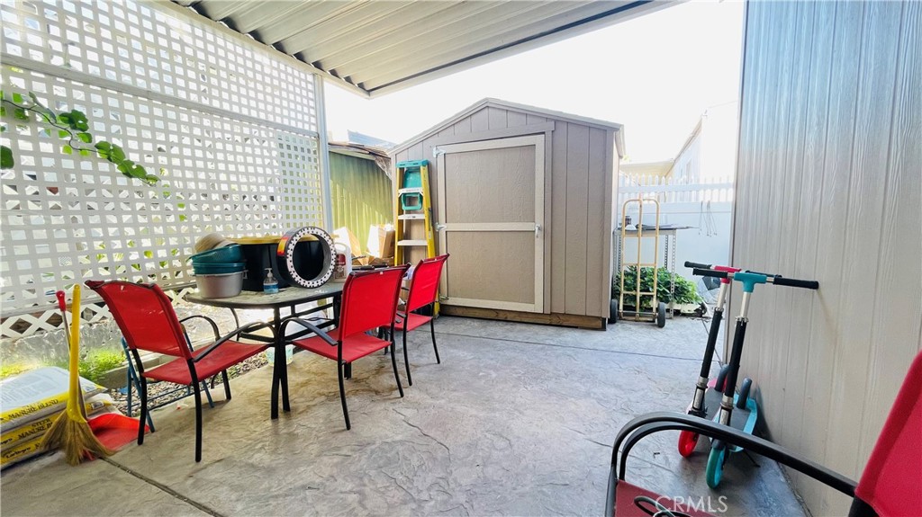 2139 East 4th Street, Unit 142 Ontario, CA 91764 - Photo 32 of 34 a view of a room with furniture and air conditioner