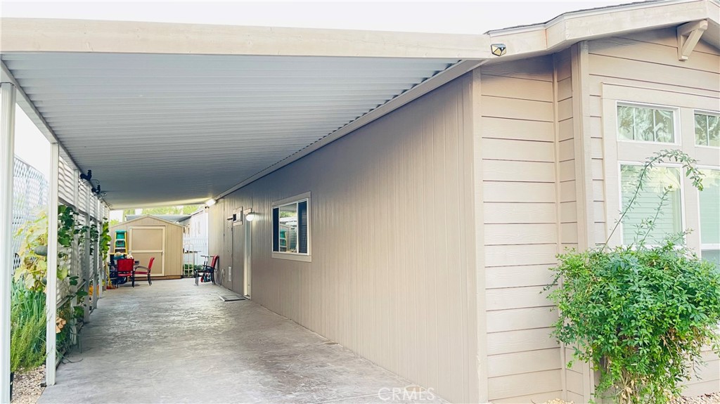 2139 East 4th Street, Unit 142 Ontario, CA 91764 - Photo 5 of 34 a backyard of a house with outdoor seating