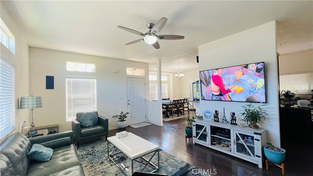2139 East 4th Street, Unit 142 Ontario, CA 91764 - Photo 6 of 34 a living room with furniture and a flat screen tv
