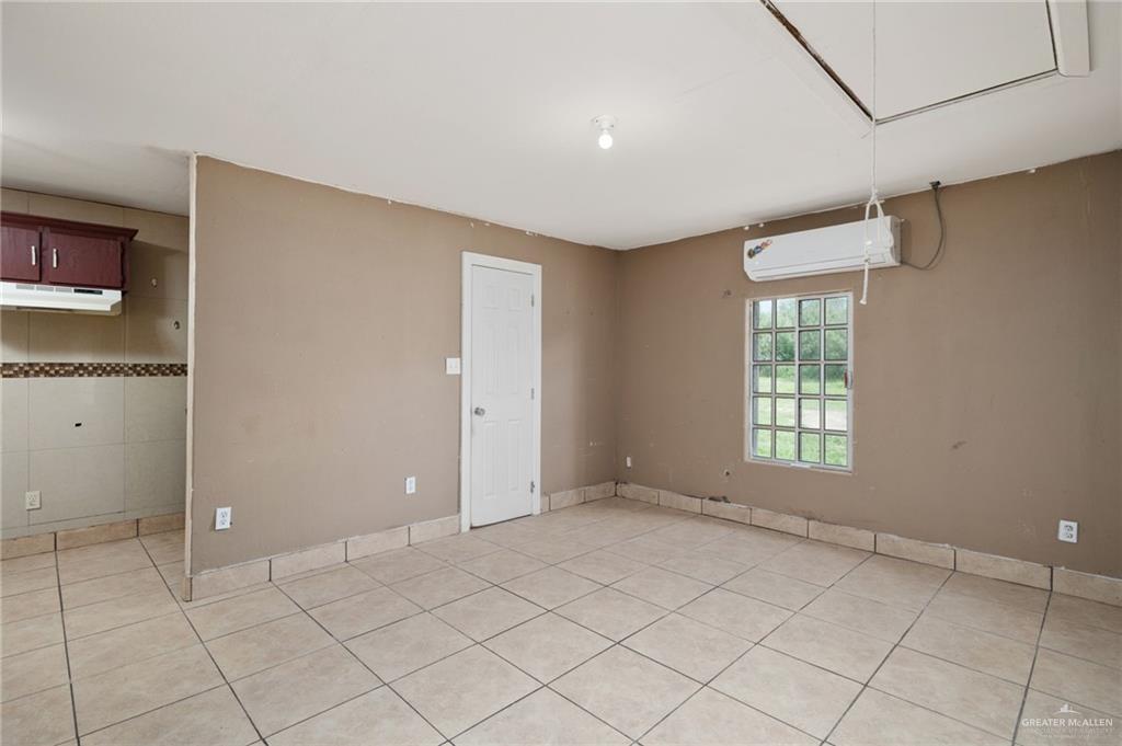 6610 West Mile 2 Road Mission, TX 78574 - Photo 13 of 18 a view of an empty room with window