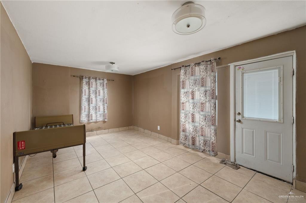 6610 West Mile 2 Road Mission, TX 78574 - Photo 15 of 18 a view of an empty room with a window