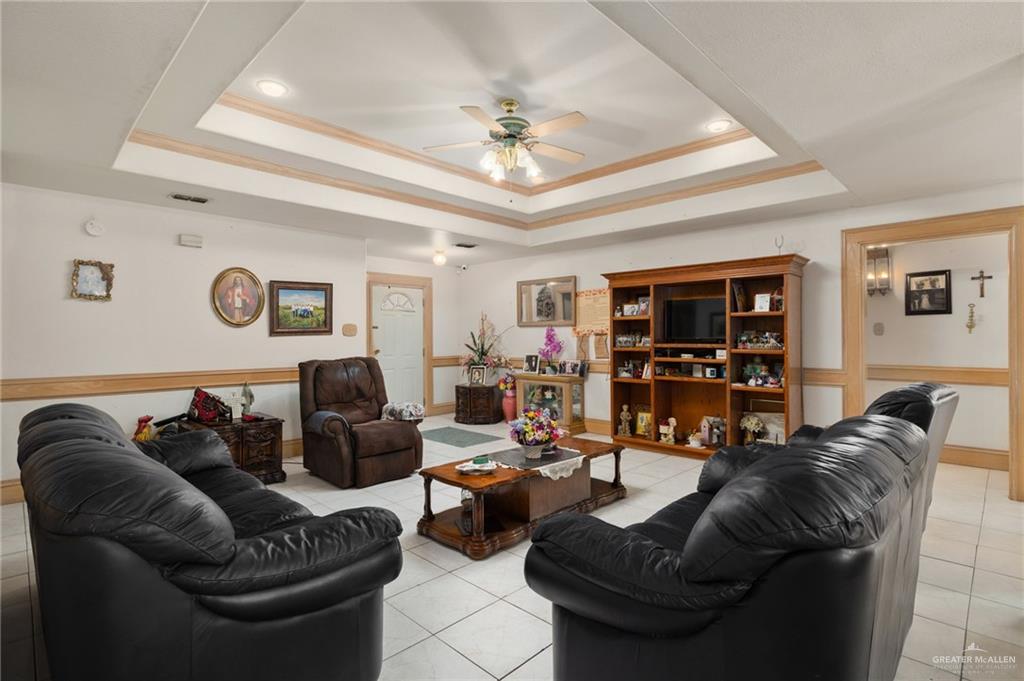 6610 West Mile 2 Road Mission, TX 78574 - Photo 3 of 18 a living room with furniture and a ceiling fan