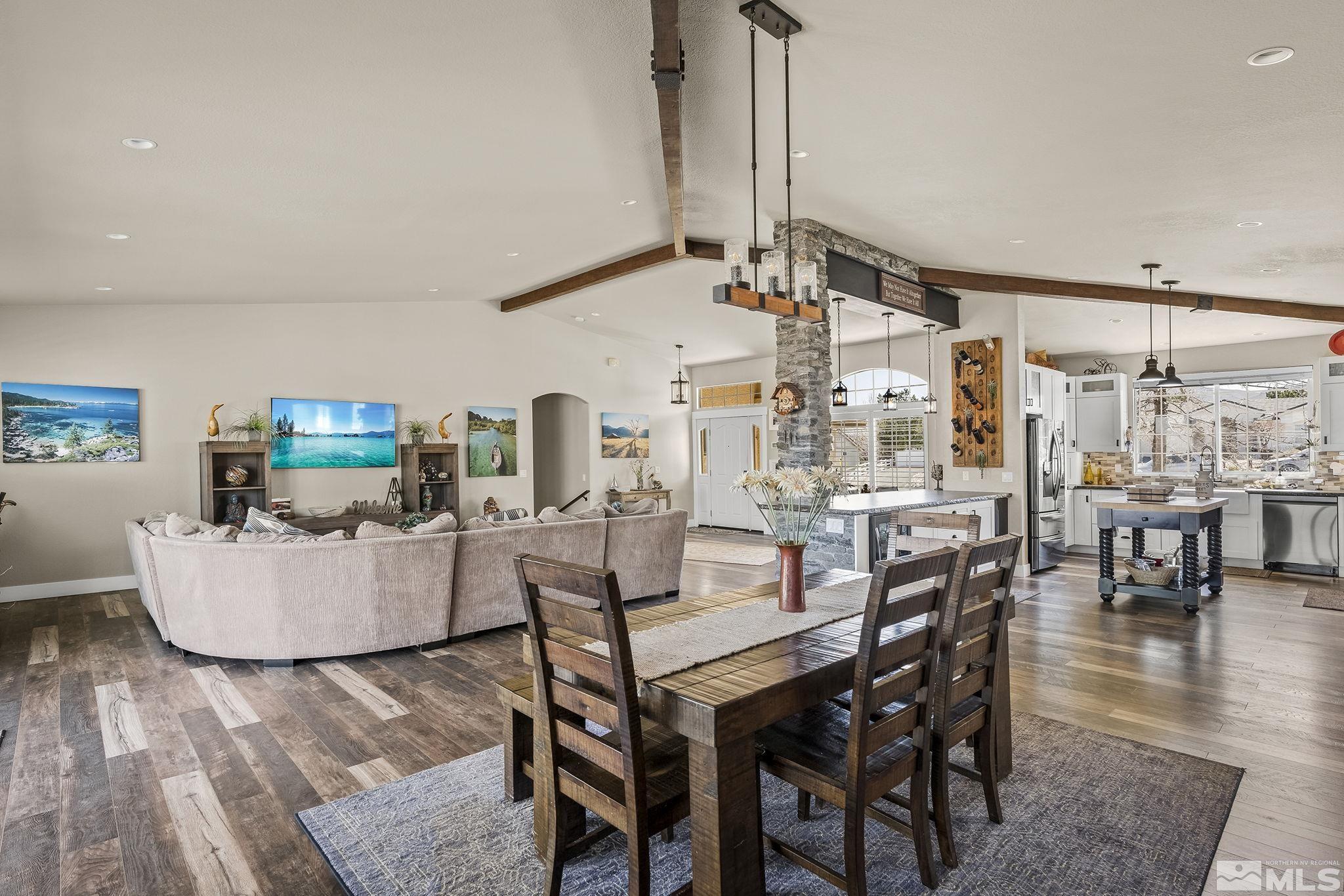 735 Flanders Road Reno, NV 89511 - Photo 11 of 40 a view of a dining room with furniture window and wooden floor