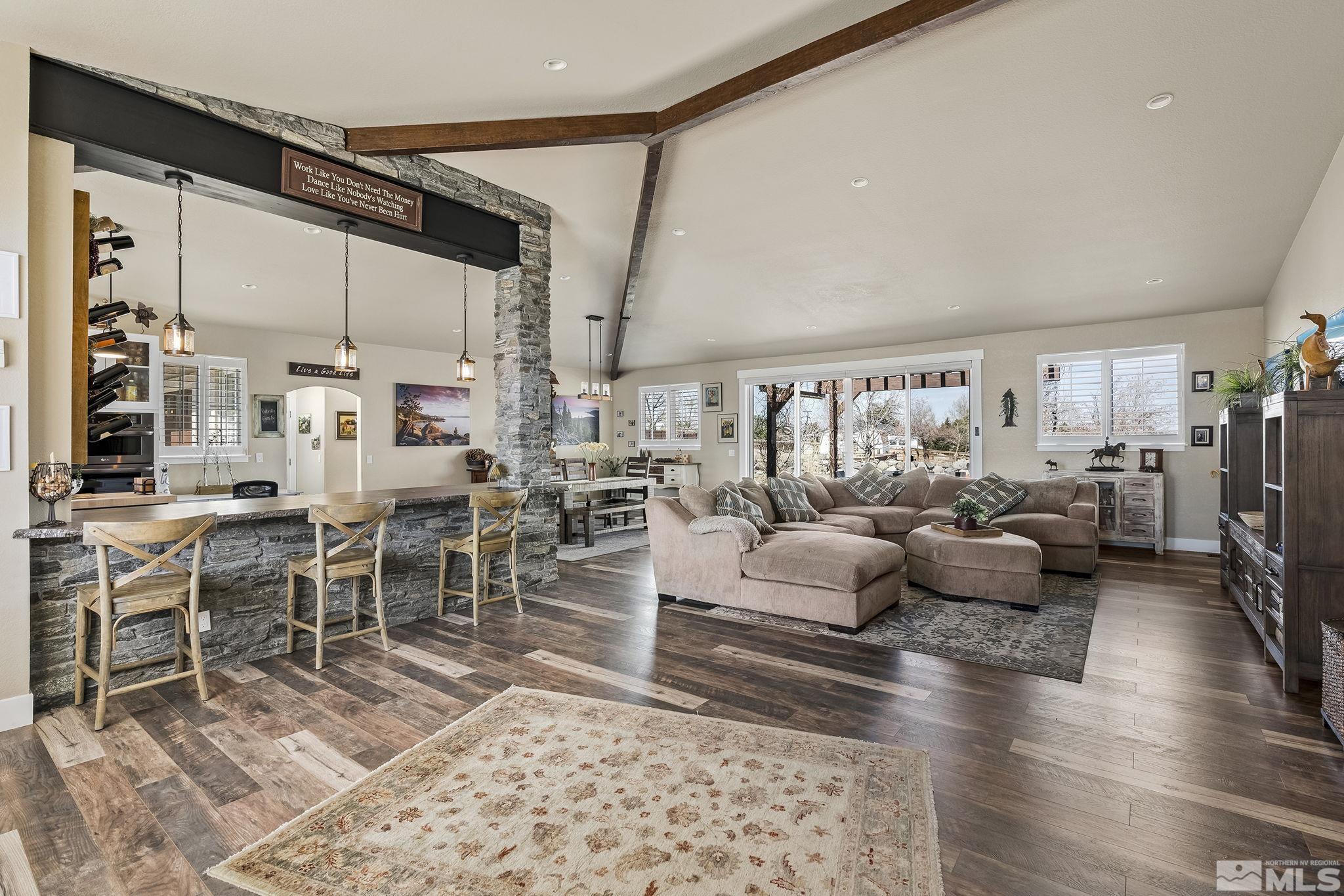 735 Flanders Road Reno, NV 89511 - Photo 5 of 40 a living room with lots of furniture and view of kitchen