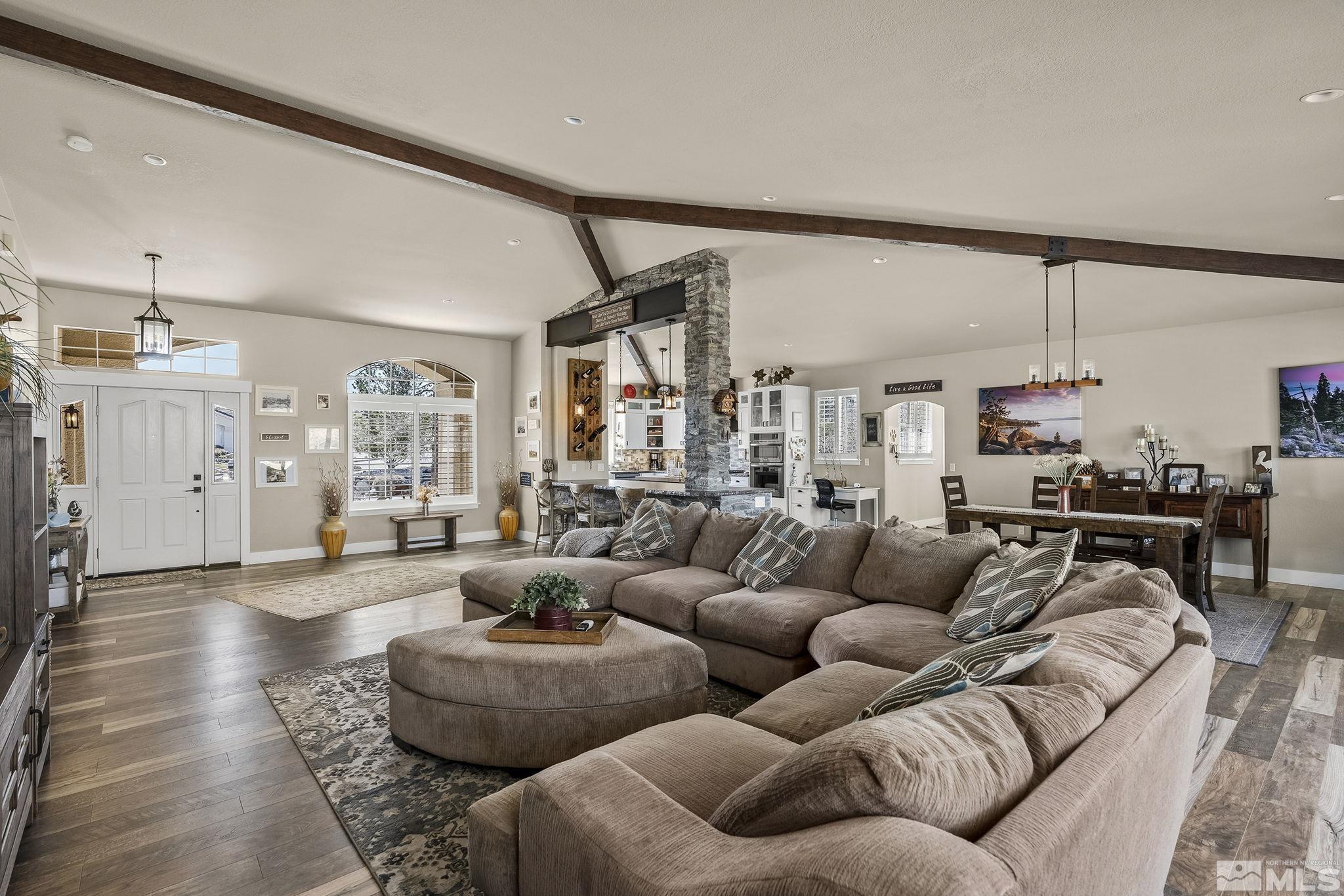 735 Flanders Road Reno, NV 89511 - Photo 8 of 40 a living room with furniture and a large window