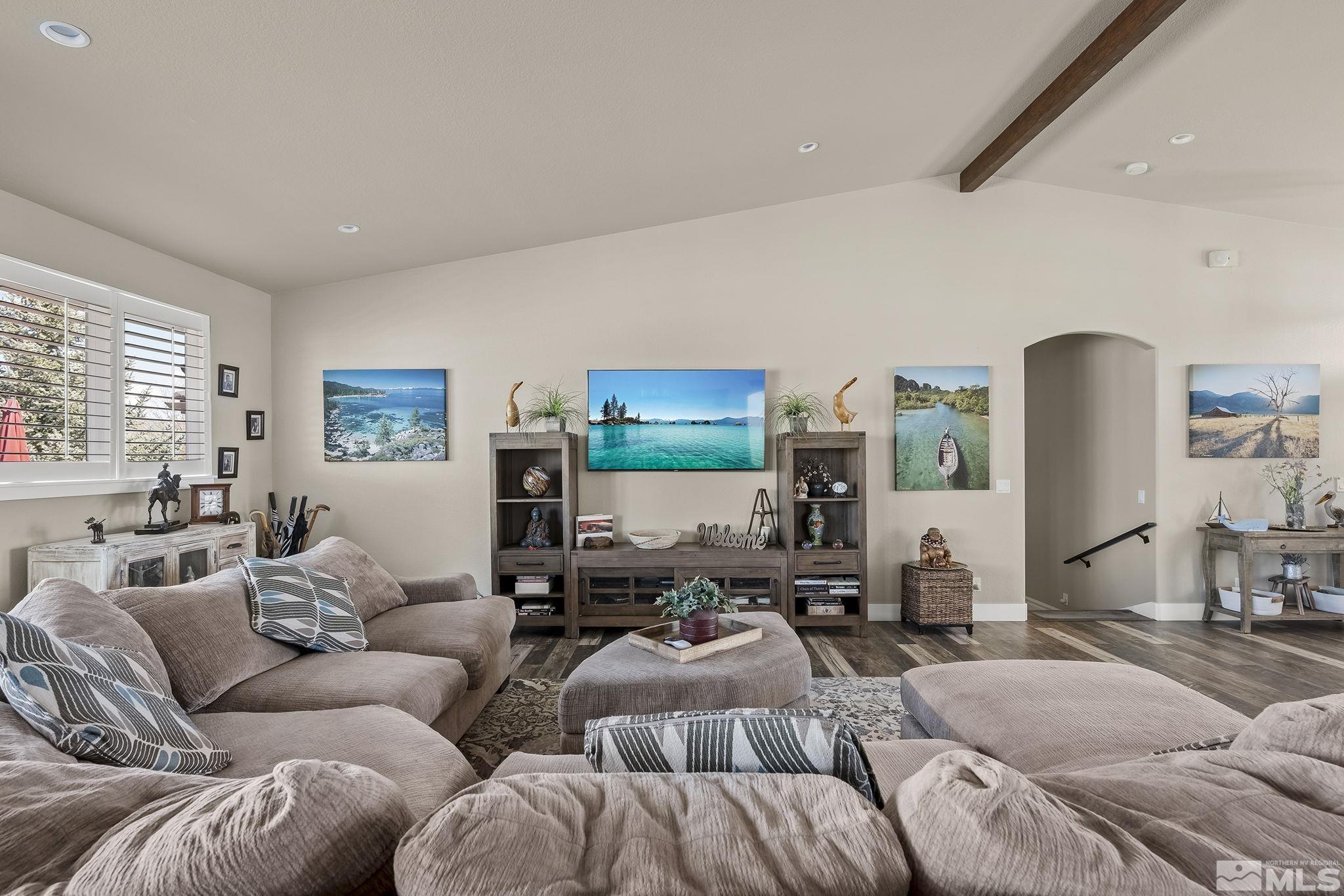 735 Flanders Road Reno, NV 89511 - Photo 9 of 40 a living room with furniture and a flat screen tv