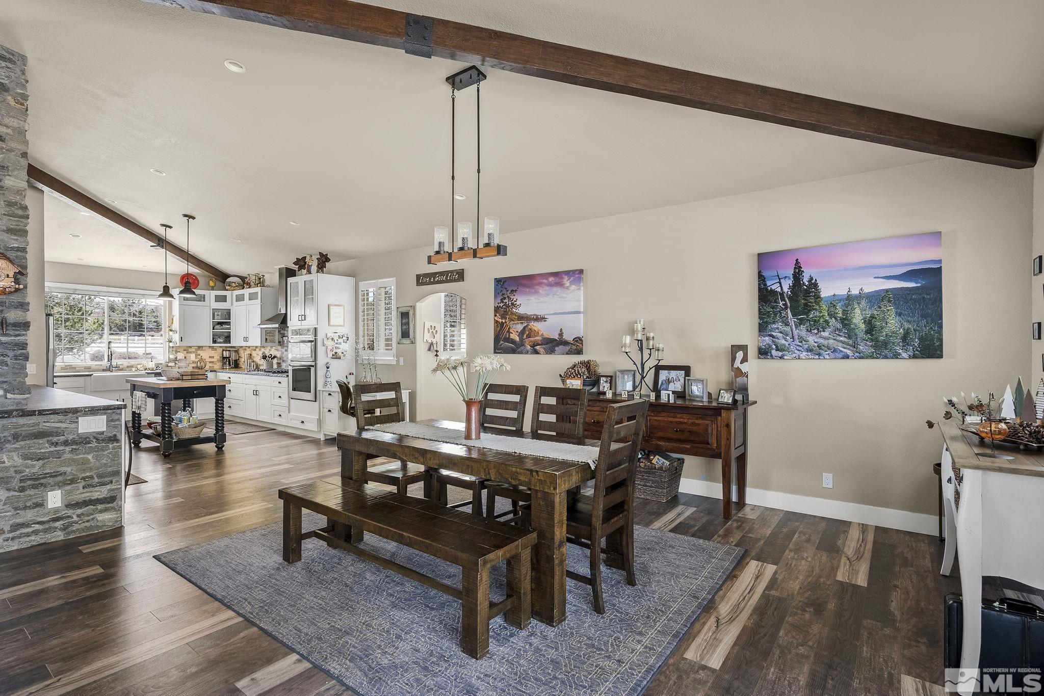 735 Flanders Road Reno, NV 89511 - Photo 10 of 40 a living room with lots of furniture and painting on the wall