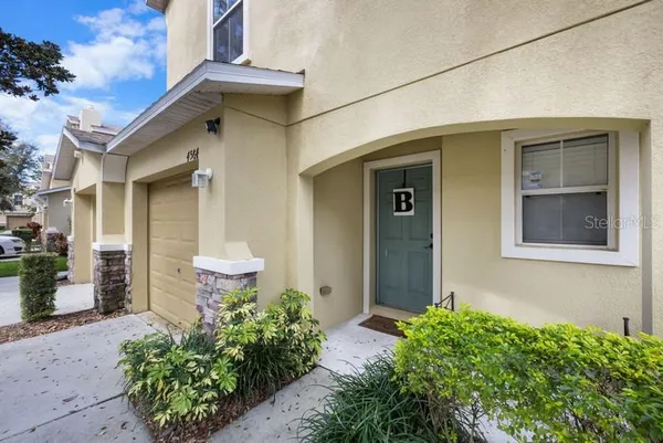 a front view of a house with an outdoor space
