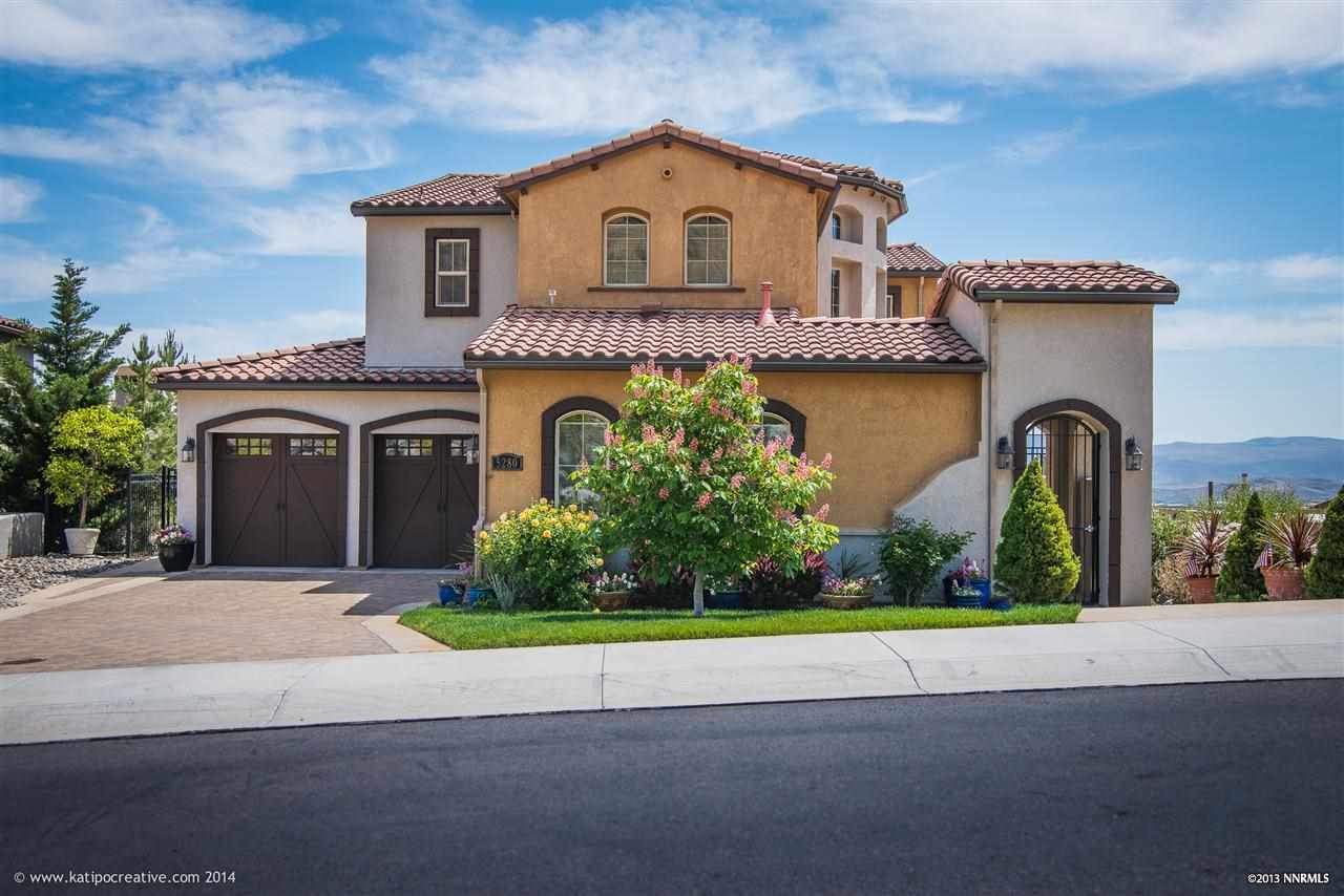 5280 Bellazza Court Reno, NV 89519 - Photo 1 of 1 a front view of a house with a garden
