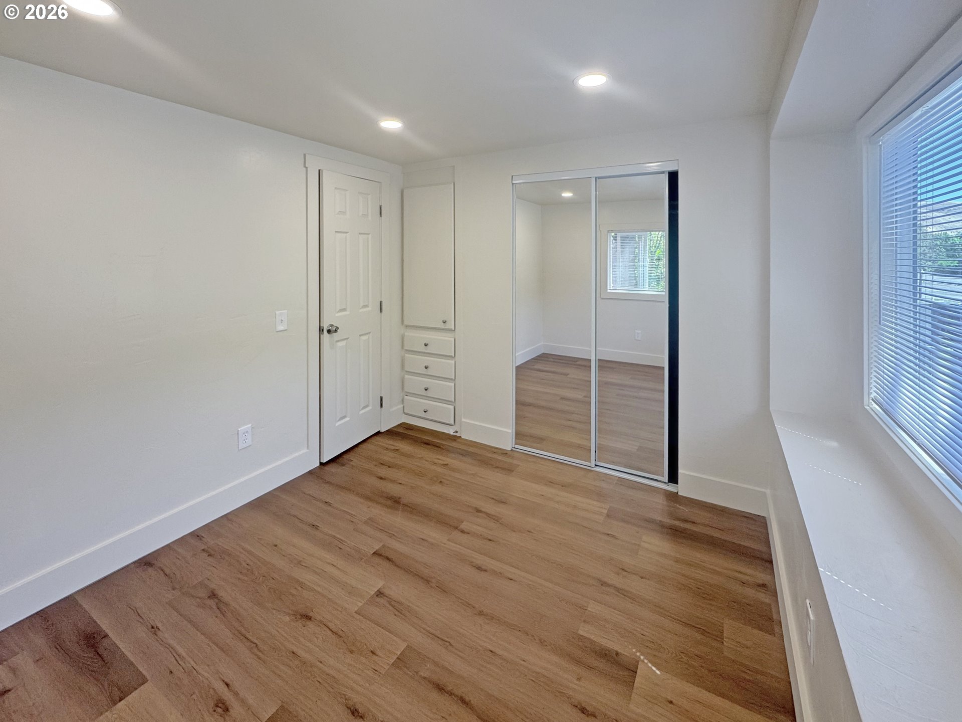 53945 Highway 86 Halfway, OR 97834 - Photo 42 of 48 a view of empty room with wooden floor and fan
