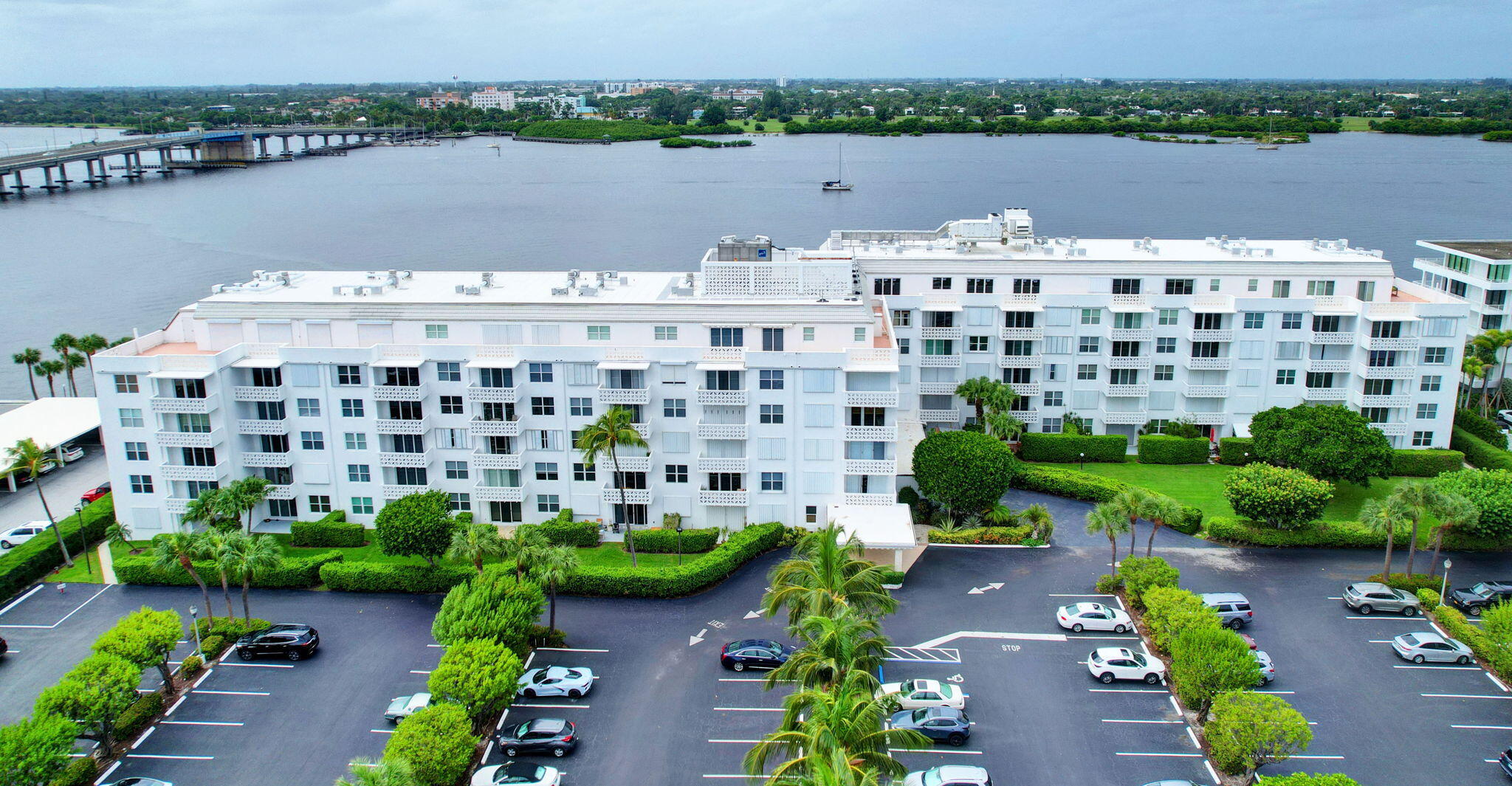 2840 South Ocean Boulevard, Unit 3020 Palm Beach, FL 33480 - Photo 23 of 40 a view of building with outdoor space and lake