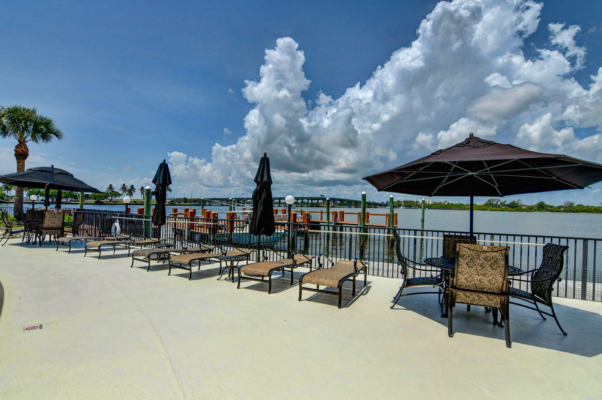 2840 South Ocean Boulevard, Unit 3020 Palm Beach, FL 33480 - Photo 27 of 40 a view of swimming pool with outdoor seating