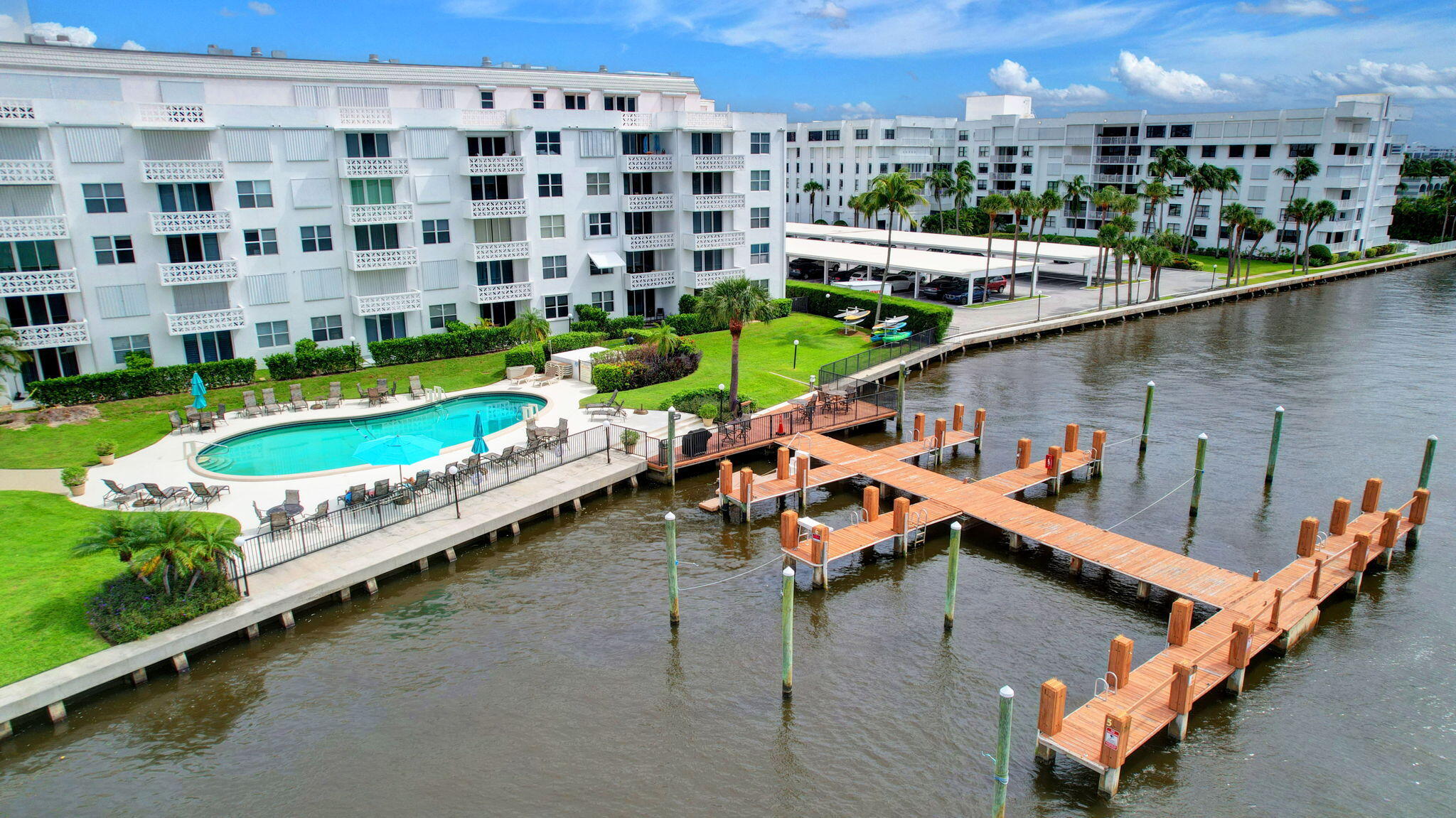 2840 South Ocean Boulevard, Unit 3020 Palm Beach, FL 33480 - Photo 32 of 40 a aerial view of a house with a swimming pool outdoor seating
