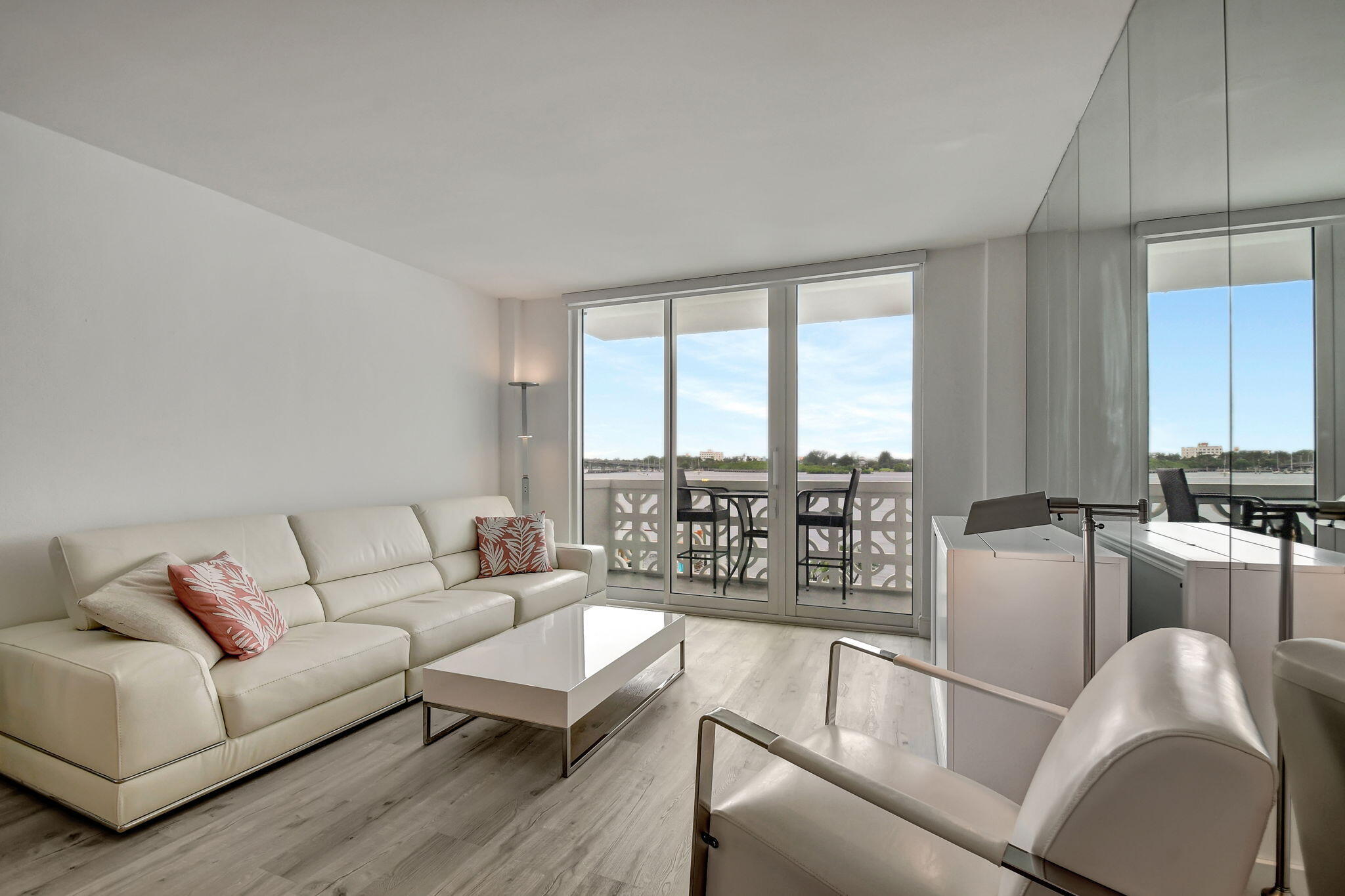 2840 South Ocean Boulevard, Unit 3020 Palm Beach, FL 33480 - Photo 6 of 40 a living room with furniture and floor to ceiling windows