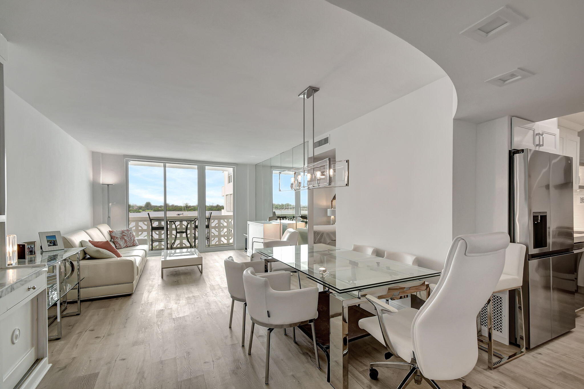 2840 South Ocean Boulevard, Unit 3020 Palm Beach, FL 33480 - Photo 8 of 40 a view of a dining room with furniture and wooden floor