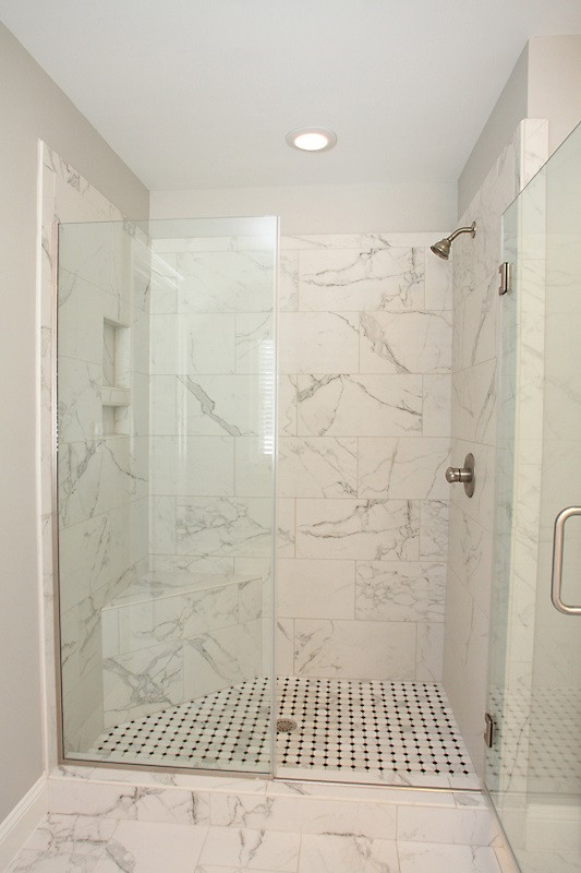 508 Mial Street Raleigh, NC 27608 - Photo 16 of 25 The large master shower has a frameless glass surround and oversized tile. Master Shower