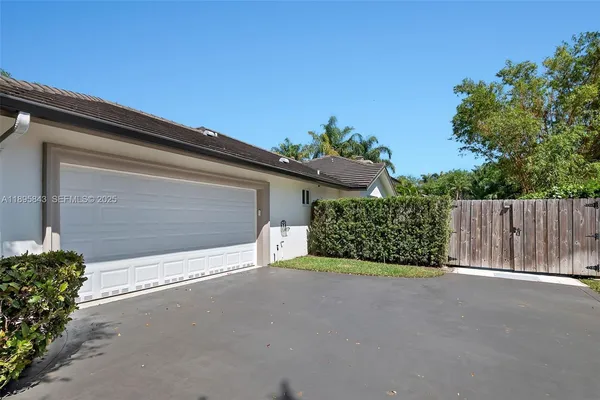 a view of a house with a garage
