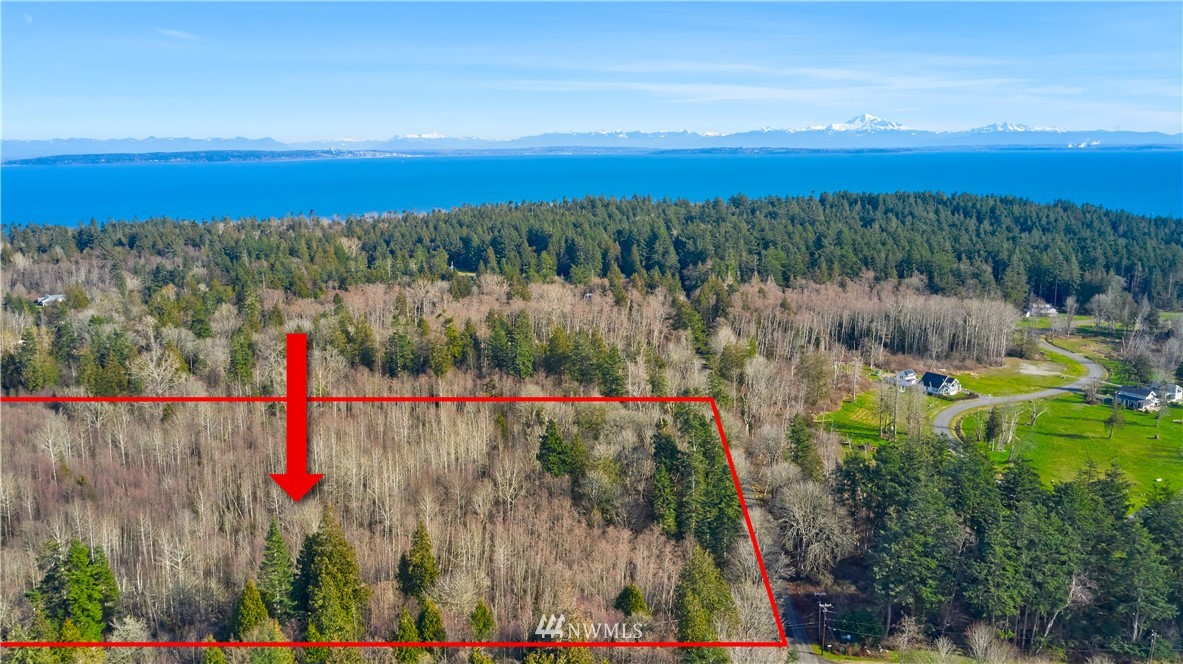 2168 APA Road Point Roberts, WA 98281 - Photo 11 of 37 a view of a houses with a yard and lake view