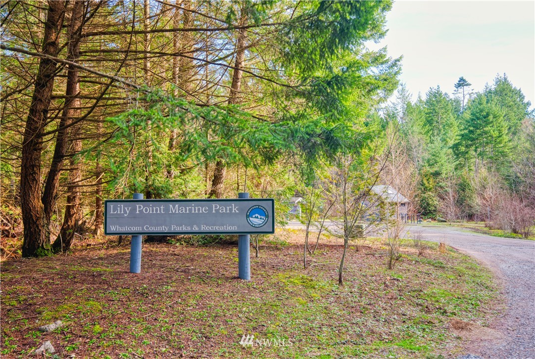 2168 APA Road Point Roberts, WA 98281 - Photo 27 of 37 a backyard of a house with table and chairs