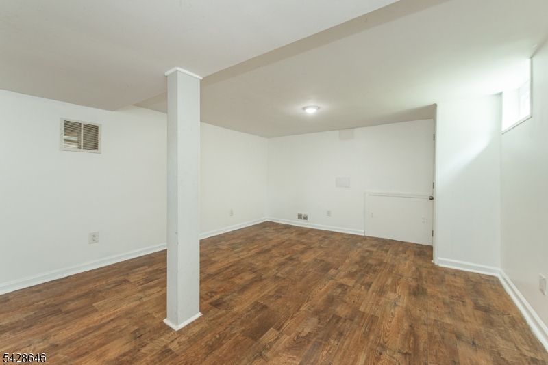 537 Dell Road Mount Arlington, NJ 07850 - Photo 17 of 23 a view of a room with wooden floor