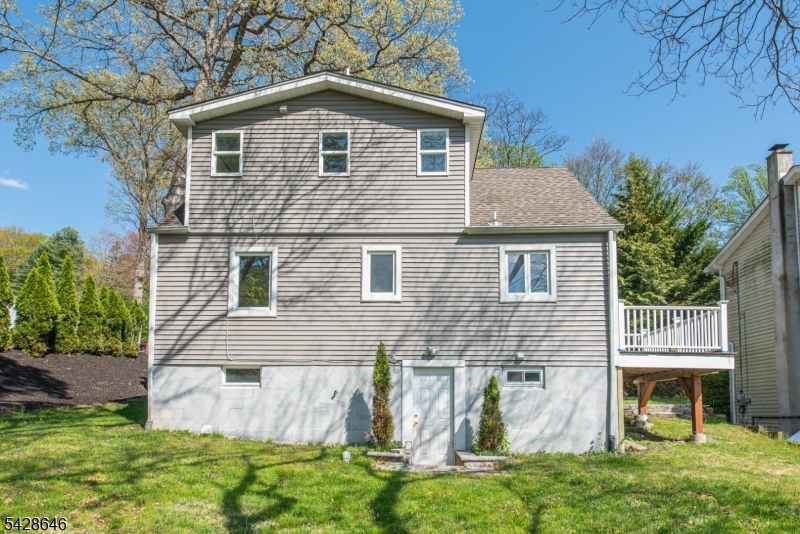 537 Dell Road Mount Arlington, NJ 07850 - Photo 20 of 23 front view of a house with a yard