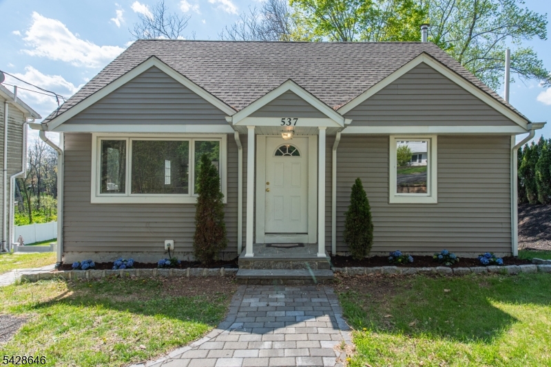 537 Dell Road Mount Arlington, NJ 07850 - Photo 23 of 23 a front view of a house with a yard