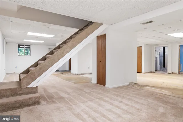 a view of a house with a tree