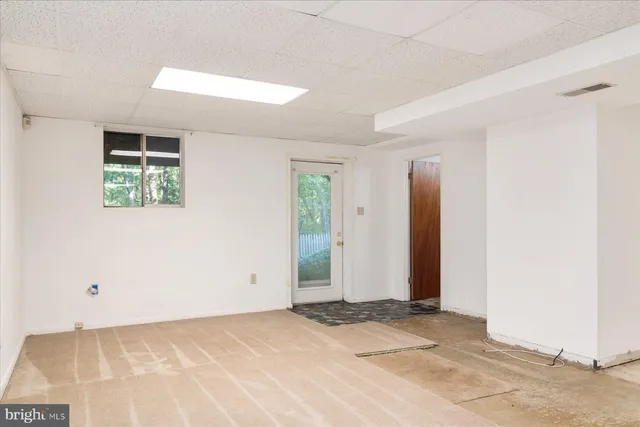 an aerial view of a house with a garden