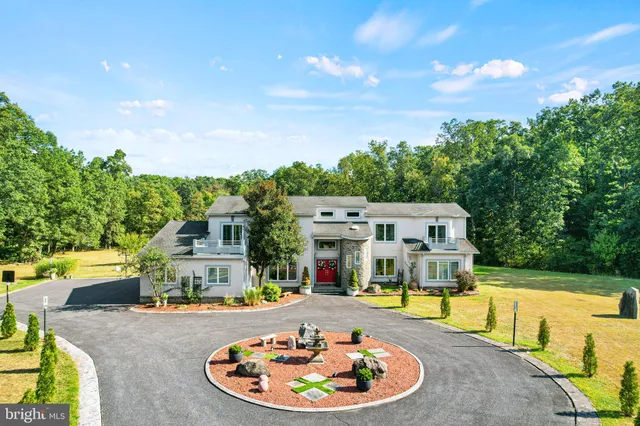 a swimming pool with outdoor seating yard and barbeque oven