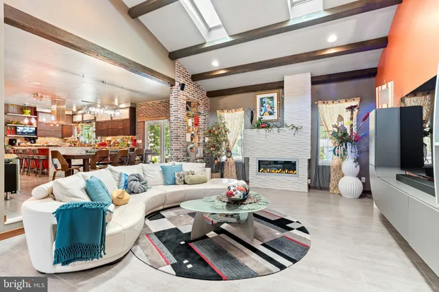 a bathroom with a sink and mirror with toilet