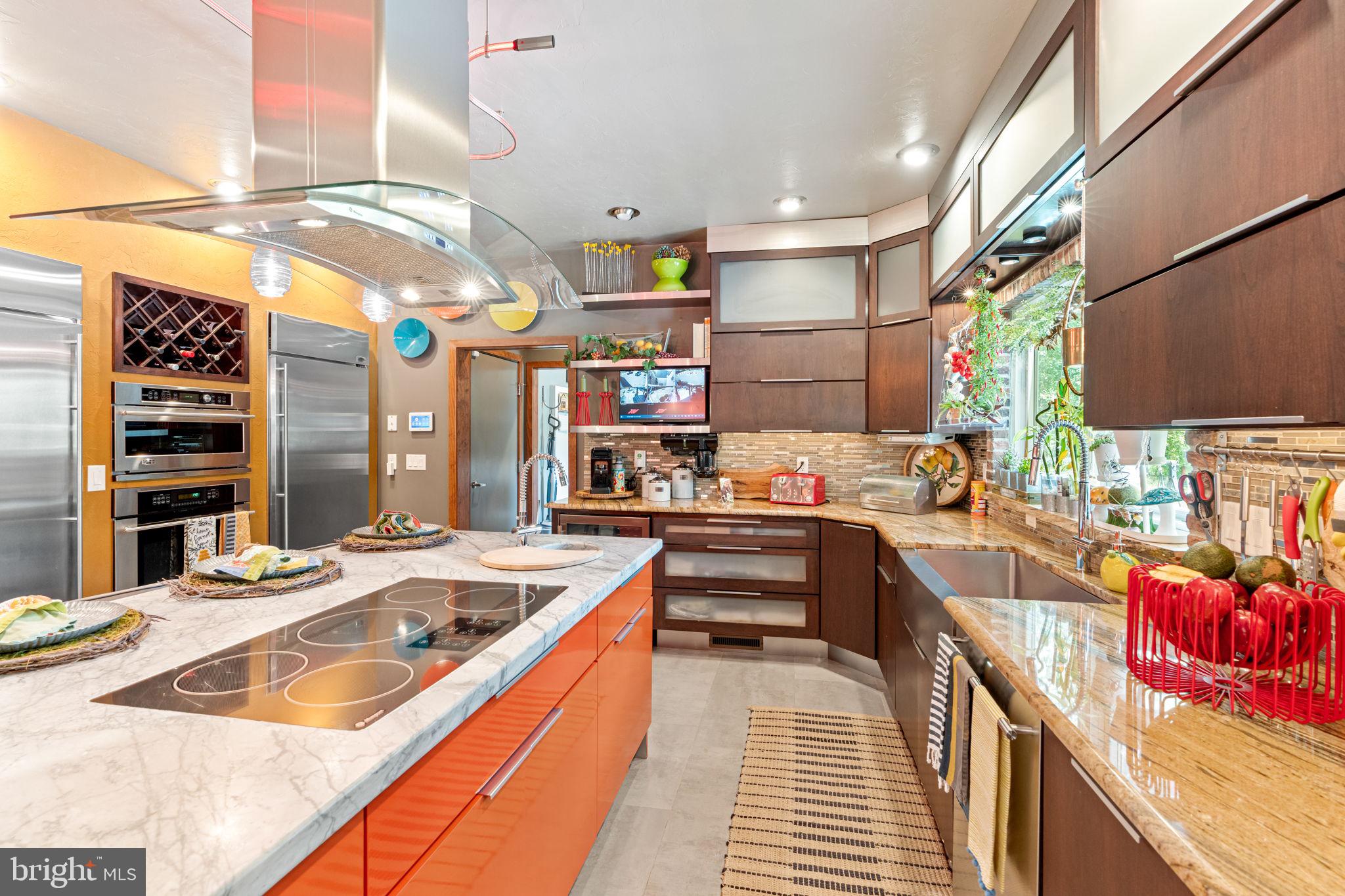 75 Cavalry Field Road Gettysburg, PA 17325 - Photo 30 of 147 a kitchen with stainless steel appliances kitchen island granite countertop a sink and cabinets