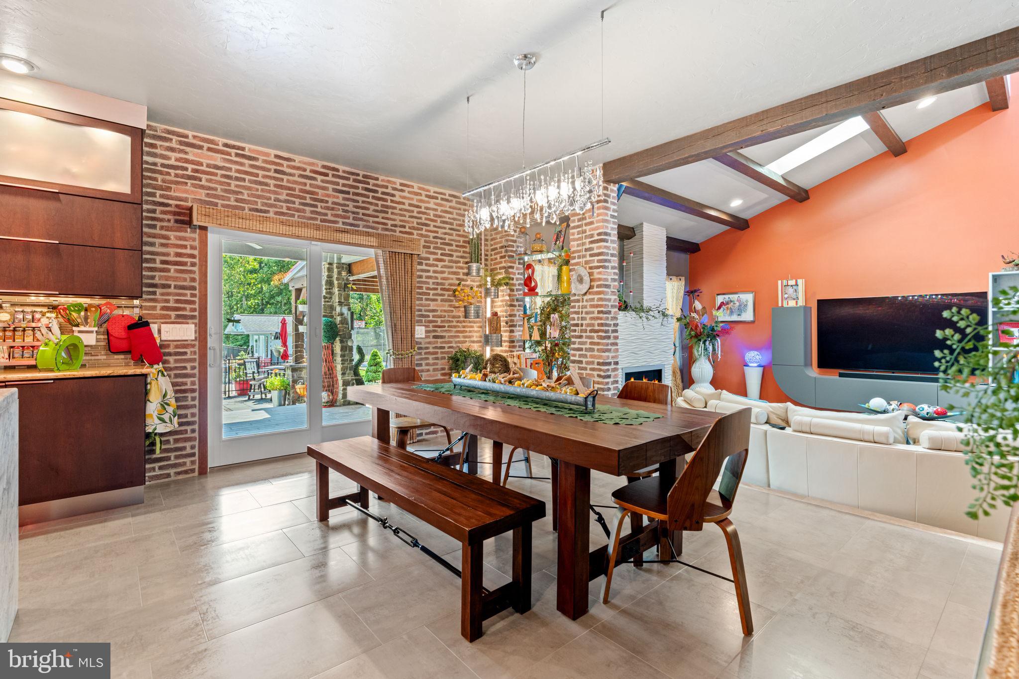 75 Cavalry Field Road Gettysburg, PA 17325 - Photo 31 of 147 a living room with furniture a flat screen tv and a floor to ceiling window