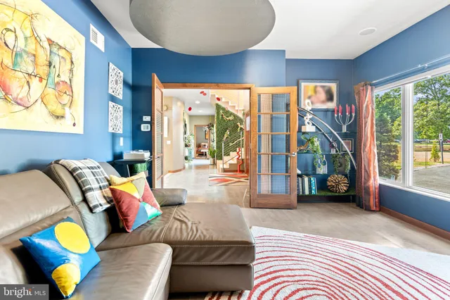 a view of a chair and tables in the patio