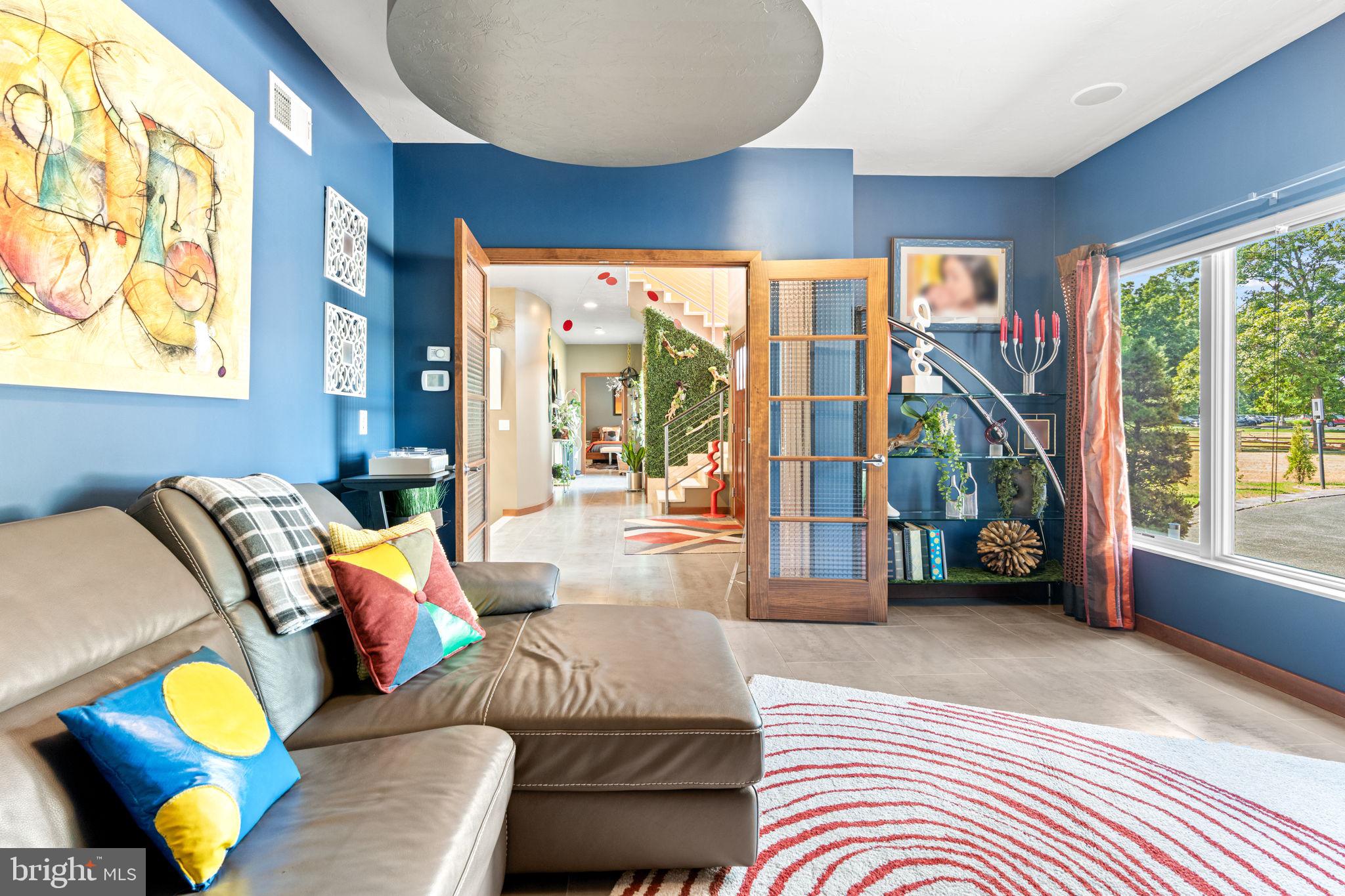 75 Cavalry Field Road Gettysburg, PA 17325 - Photo 39 of 147 a living room with furniture a couch and a large window