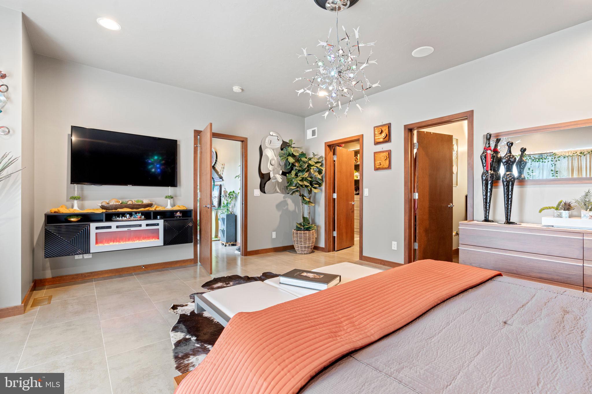 75 Cavalry Field Road Gettysburg, PA 17325 - Photo 45 of 147 a bedroom with a bed and a flat screen tv