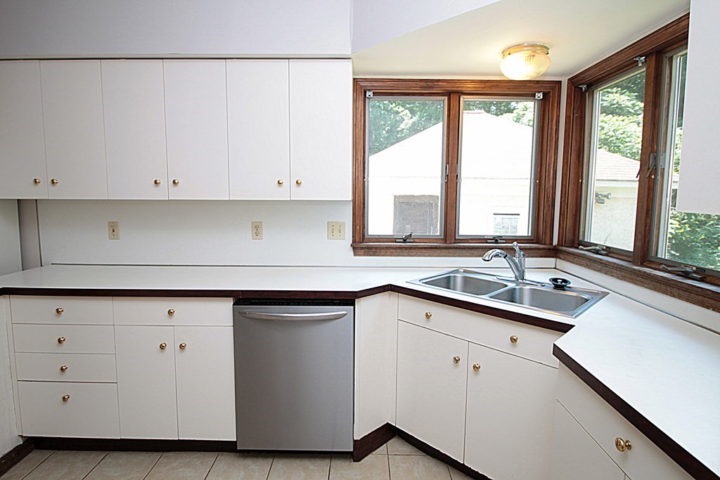 1644 Allen Street Springfield, MA 01118 - Photo 11 of 27 a kitchen with a sink and cabinets