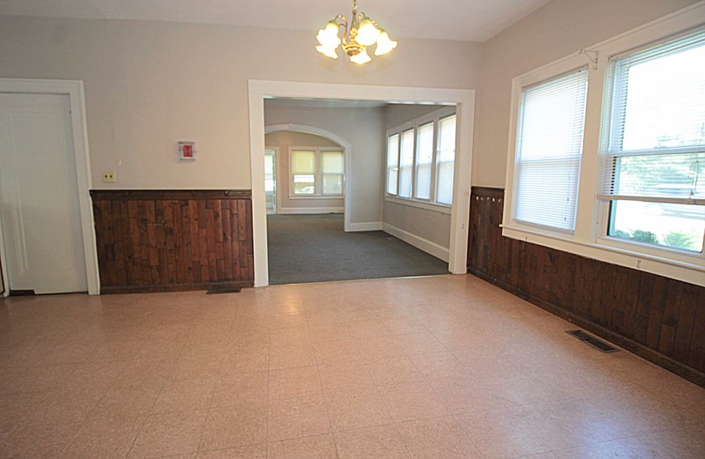 1644 Allen Street Springfield, MA 01118 - Photo 12 of 27 an empty room with windows and entrance