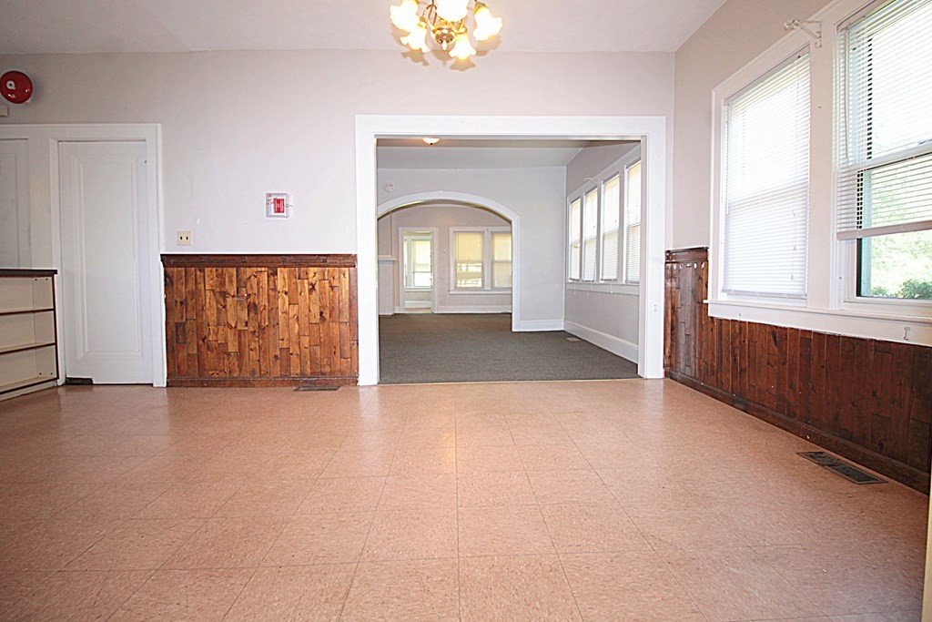 1644 Allen Street Springfield, MA 01118 - Photo 15 of 27 wooden floor in an empty room with a window