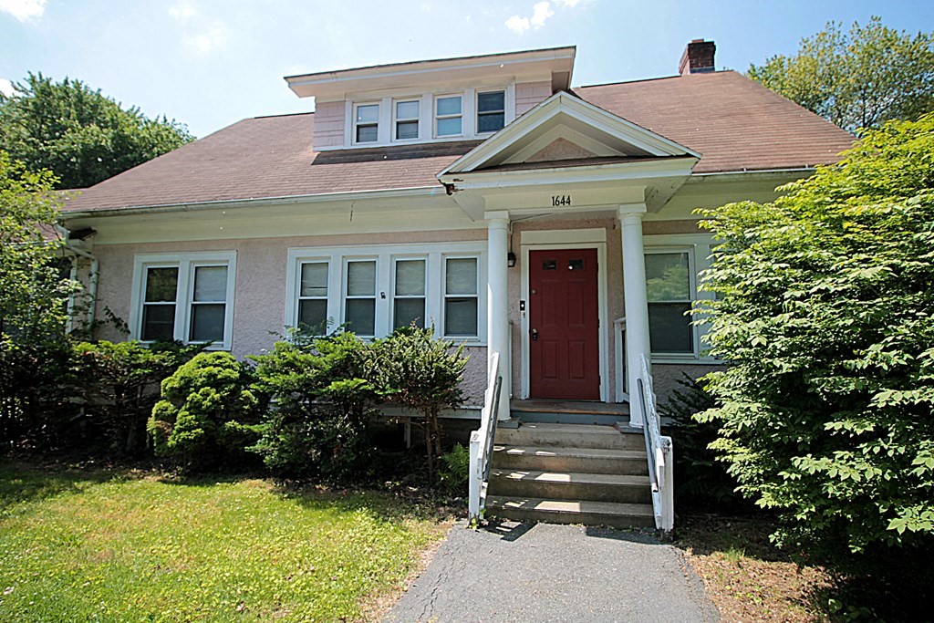 1644 Allen Street Springfield, MA 01118 - Photo 2 of 27 a front view of a house with garden