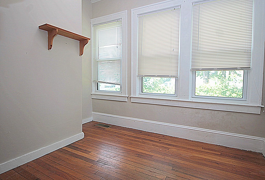 1644 Allen Street Springfield, MA 01118 - Photo 22 of 27 a view of a room with wooden floor and windows