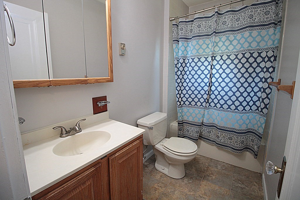 1644 Allen Street Springfield, MA 01118 - Photo 23 of 27 a bathroom with a sink toilet and shower