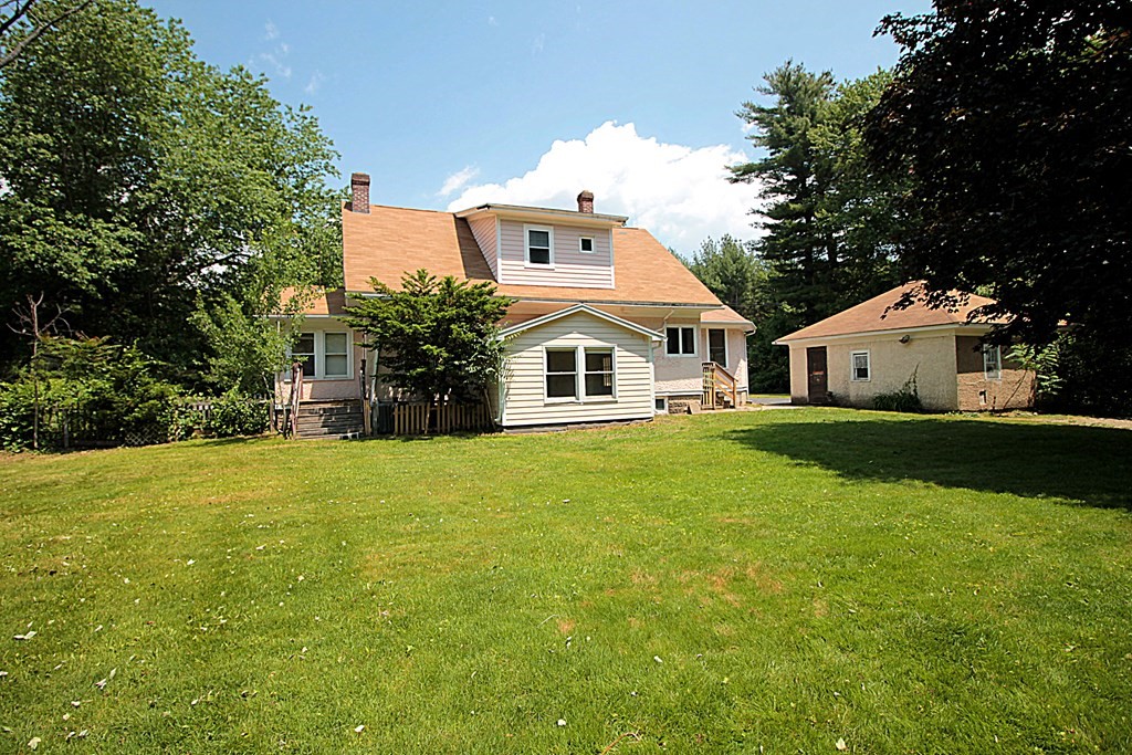 1644 Allen Street Springfield, MA 01118 - Photo 27 of 27 a front view of a house with a yard