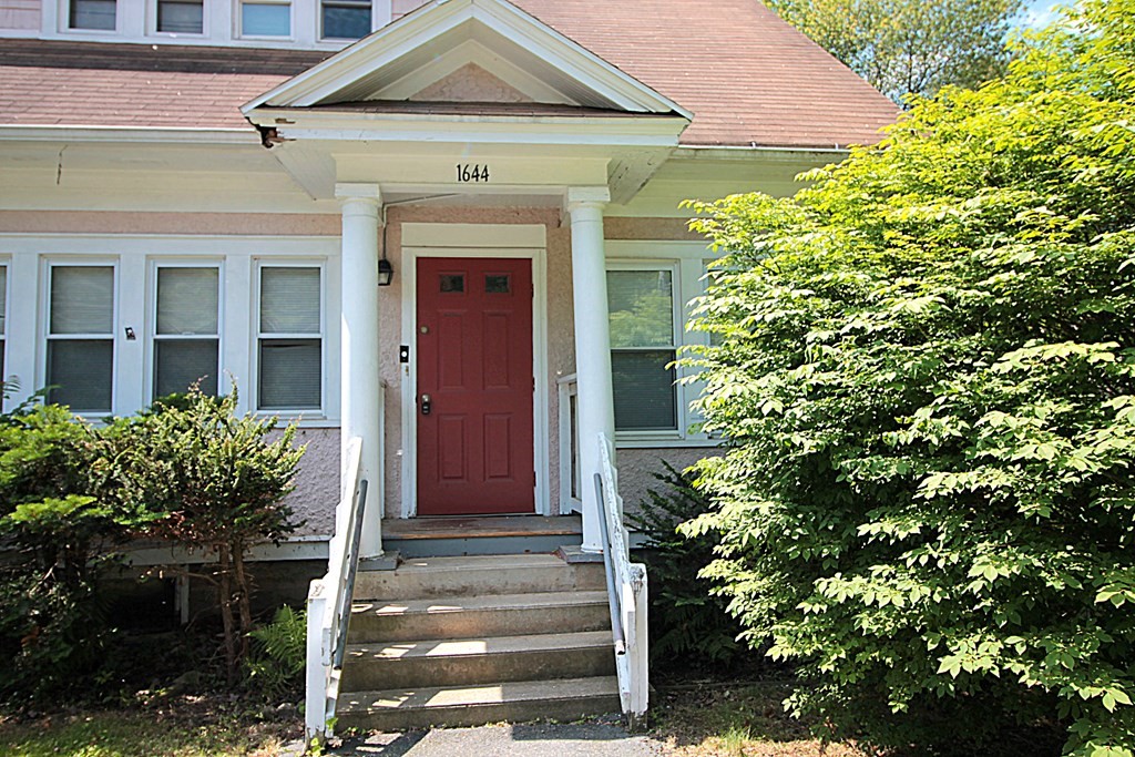 1644 Allen Street Springfield, MA 01118 - Photo 3 of 27 a front view of a house with a yard