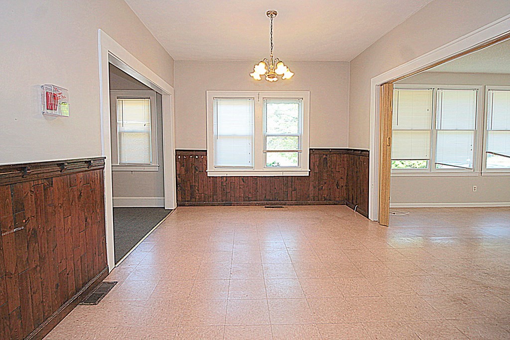 1644 Allen Street Springfield, MA 01118 - Photo 10 of 27 an empty room with windows closet and fireplace
