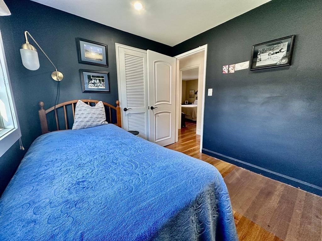 3 Day Circle Woburn, MA 01801 - Photo 12 of 42 a bed sitting in a bedroom next to a window